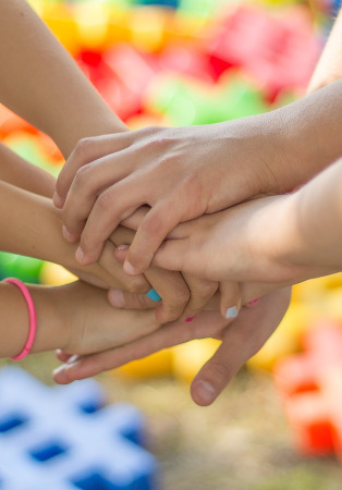 Multiple hands together